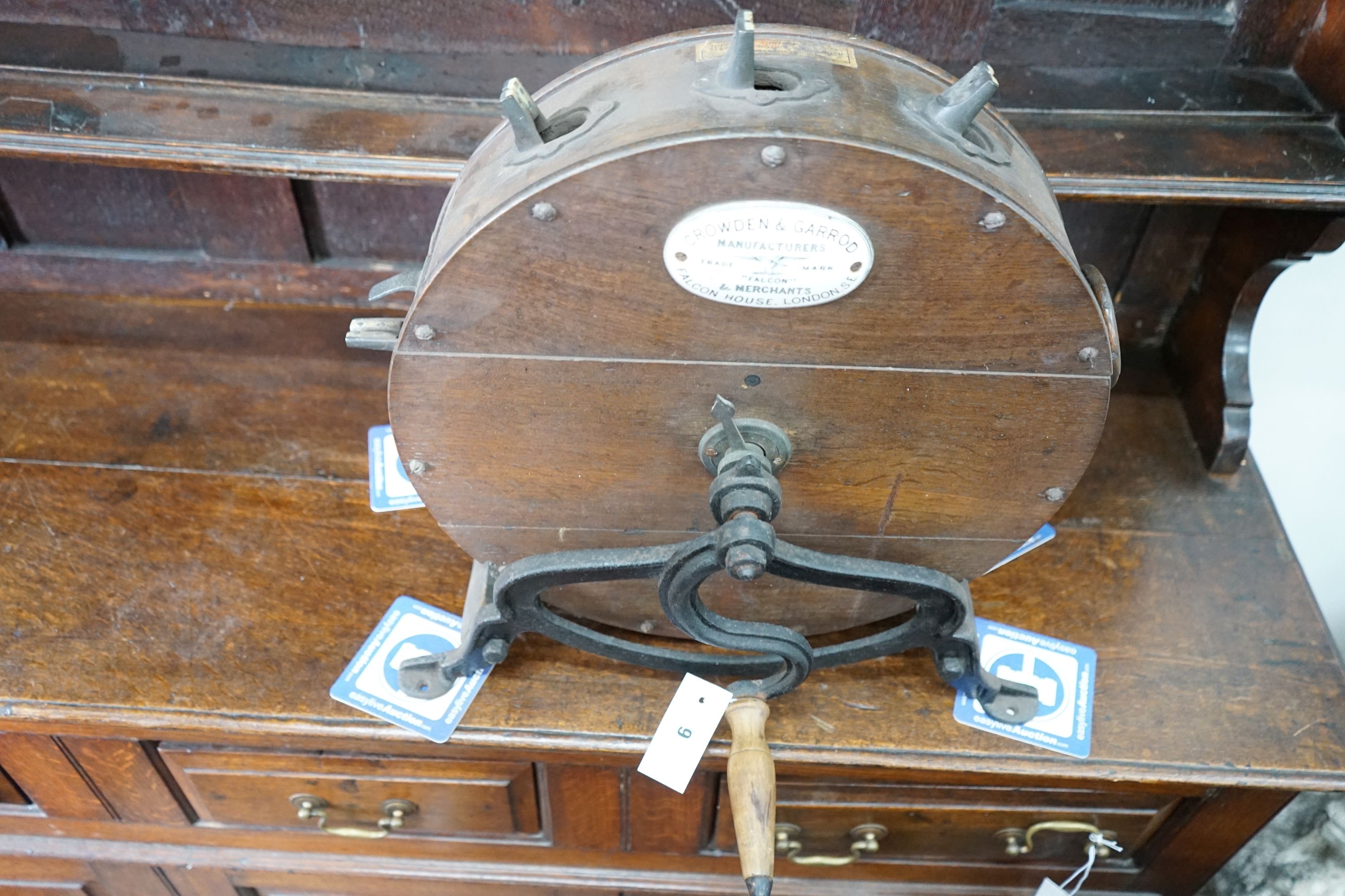 A Victorian cast iron mounted mahogany knife polisher, height 44cm